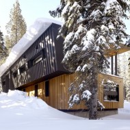 Плоская односкатная крыша коттеджа выдерживает толстый слой снега